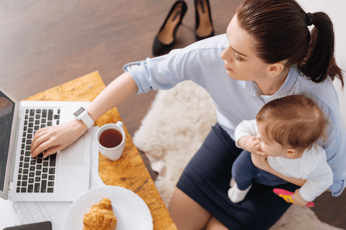 employee benefits - working parent on laptop